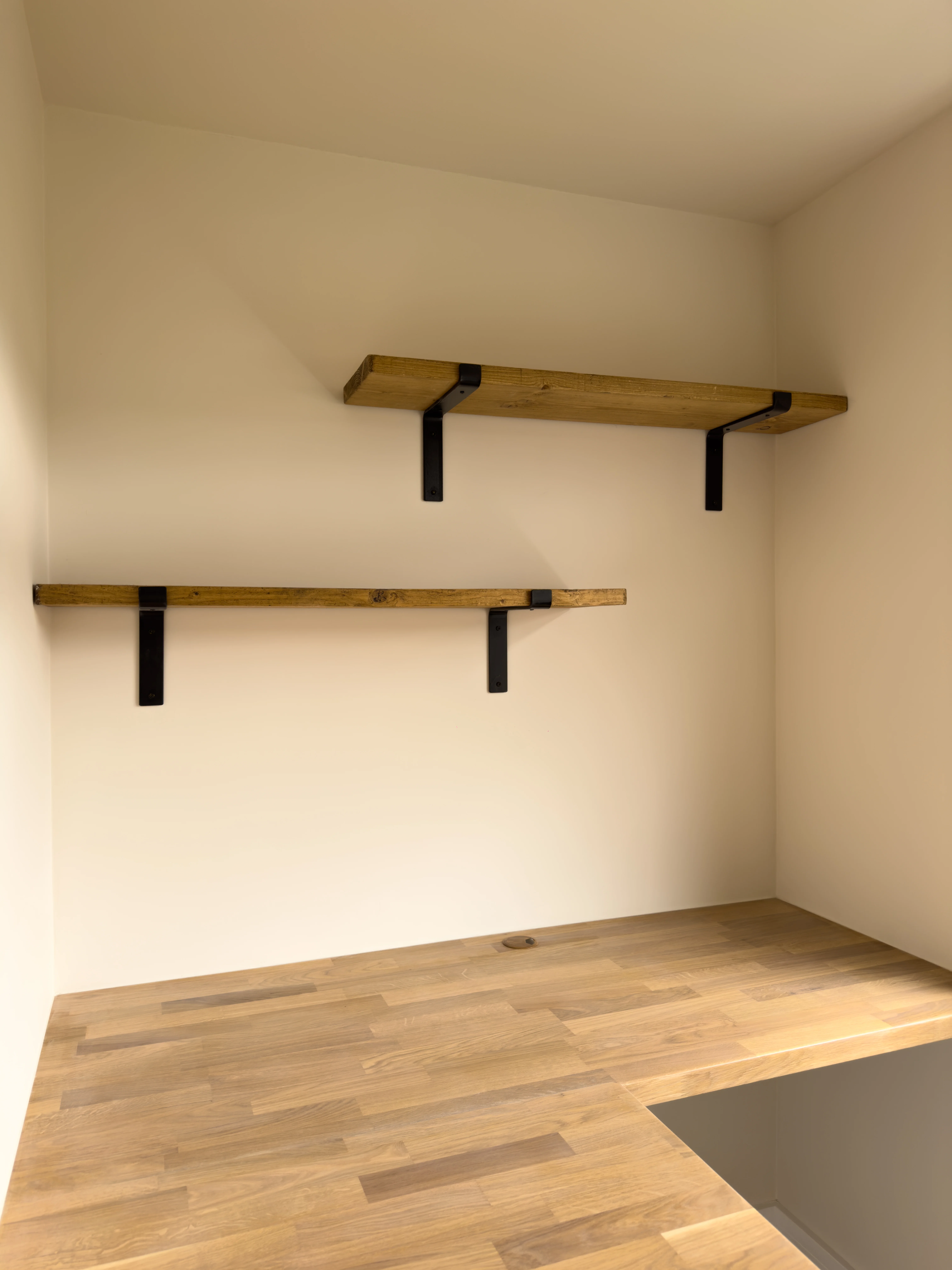 Bedroom with fitted shelving, after