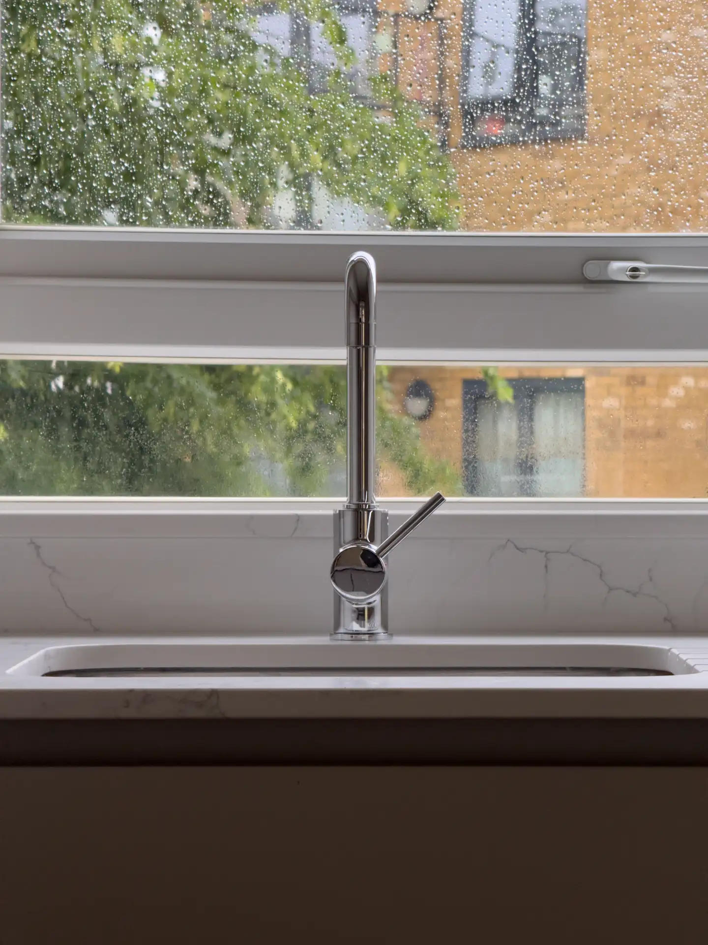 Kitchen sink and window, after