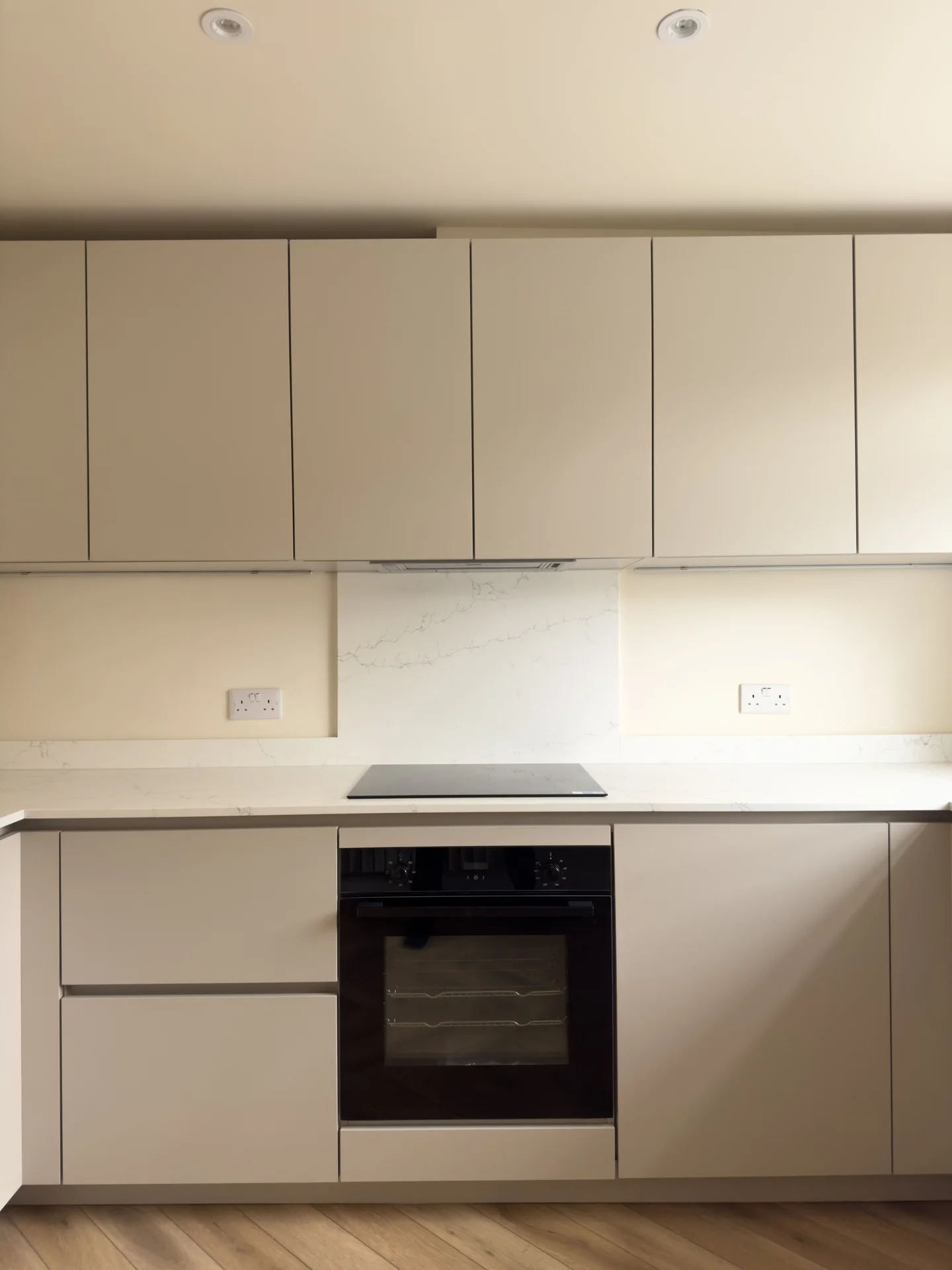 Kitchen cabinetry and oven, after